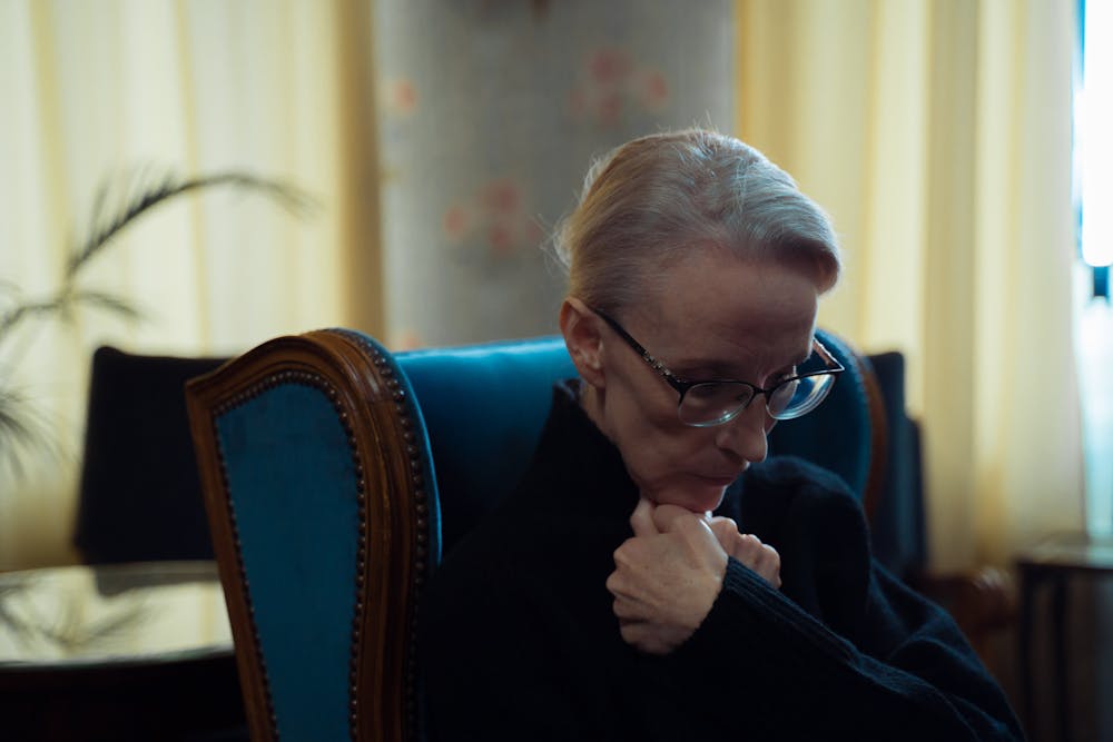 A senior woman sitting alone